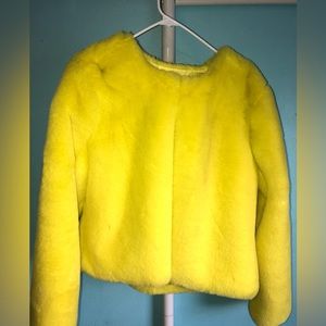 Worn once to a Christmas party. This jacket is eye-catching and very warm.